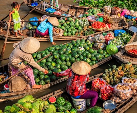 Vietnam Mekong Delta schwimmender Markt lecker Obst Gemuese