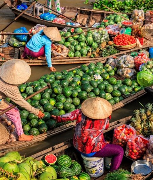 Vietnam Mekong Delta schwimmender Markt lecker Obst Gemuese