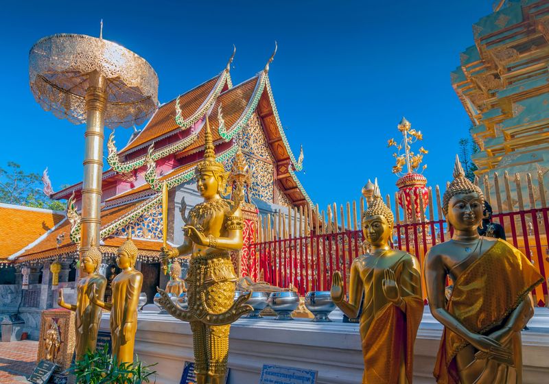 Thailand ChiangMai Line of Golden Buddhas at Wat Phrathat Doi Suthep AdobeStock 236505724
